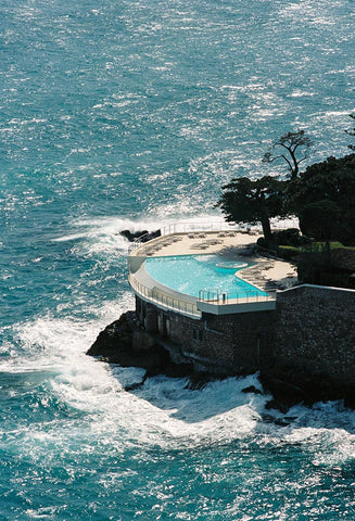 Cap Estel by Luke McCormick - A photograph of a luxe ocean-side pool on the French Riviera.