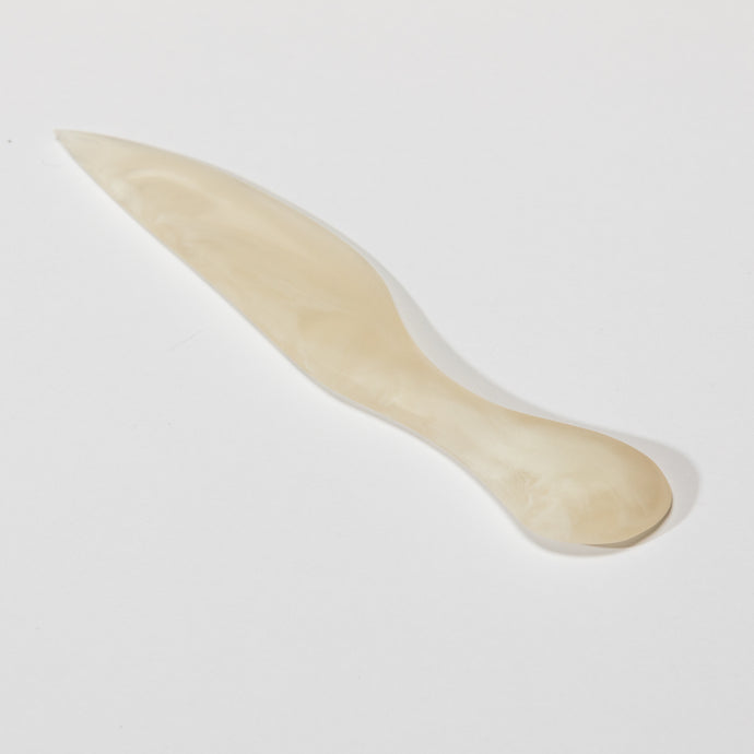 Cheese Knife Quartz by Keep Store - An image of a resin cheese knife in quartz.