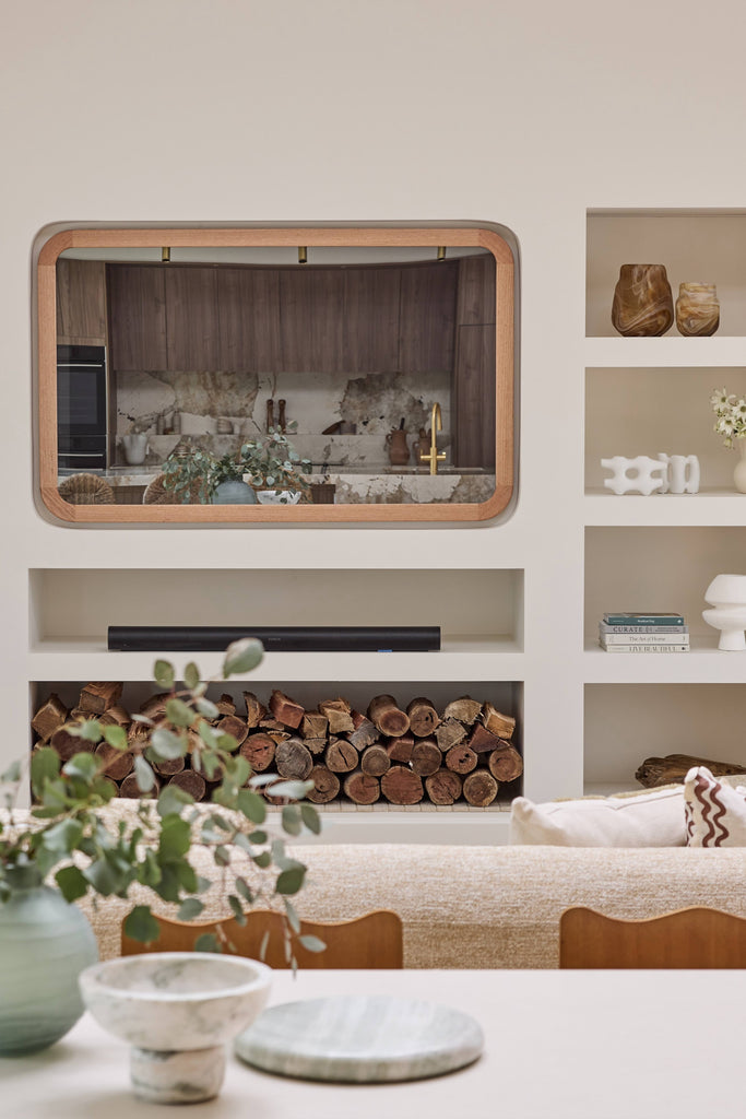 Contemporary Curve TV-Mirror by FRAMING TO A T - As seen on The Block in Courtney and Grant's Living and Dining Room, this Danish-inspired light oak timber framed TV Mirror features contemporary curved corners.