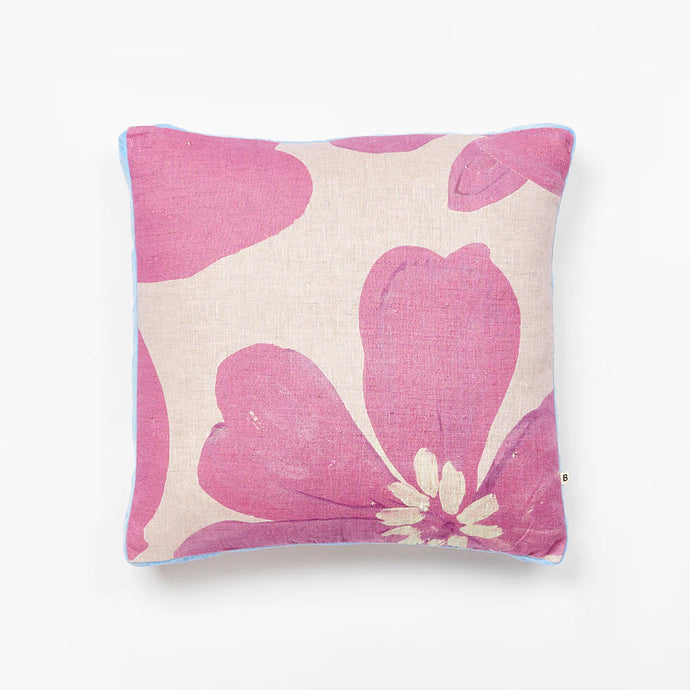 Dogwood Lilac 50cm Cushion by Bonnie and Neil - An image of a square cushion with a purple floral print and a blue trim.