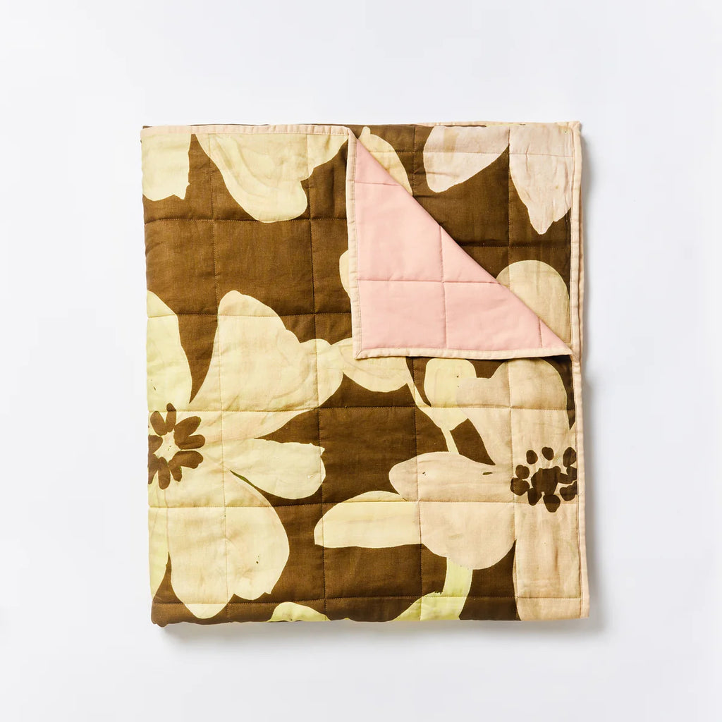 Dogwood Moss Quilted Throw by Bonnie and Neil - An image of a floral printed quilt in moss.