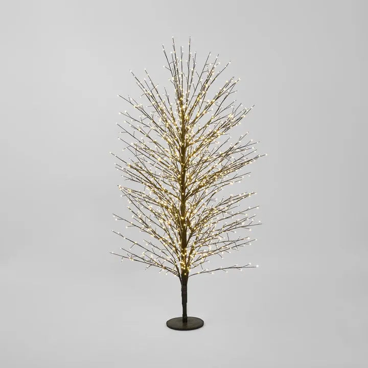 Forest Tree by Florabelle - Decorative LED tree with lights on a gray background