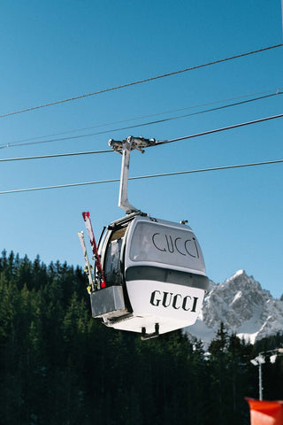Gucci Gondola by Via Tolila - A fun photograph of a Gucci branded ski gondola in the French Alps.