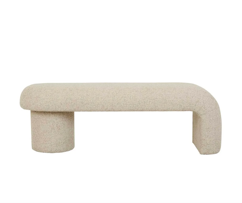 Margot Bench Seat Driftwood by GlobeWest - A contemporary styled asymmetrical profile bench seat covered in creamy driftwood coloured upholstery and crafted with a sturdy wooden frame. 