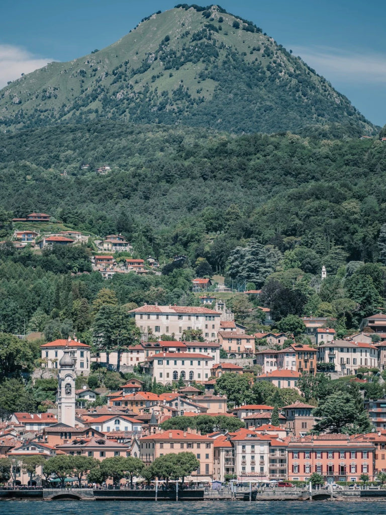 Menaggio by Via Tolila - A photographic print in green and cream pastel tones overlooking a lake view in Lake Como, Italy.