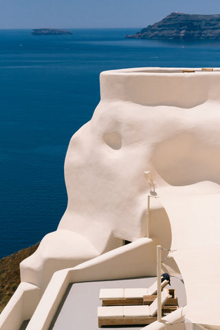Mystique Hotel II by Via Tolila - A photographic print of the Mystique Hotel in Santorini, Greece with incredible ocean views.