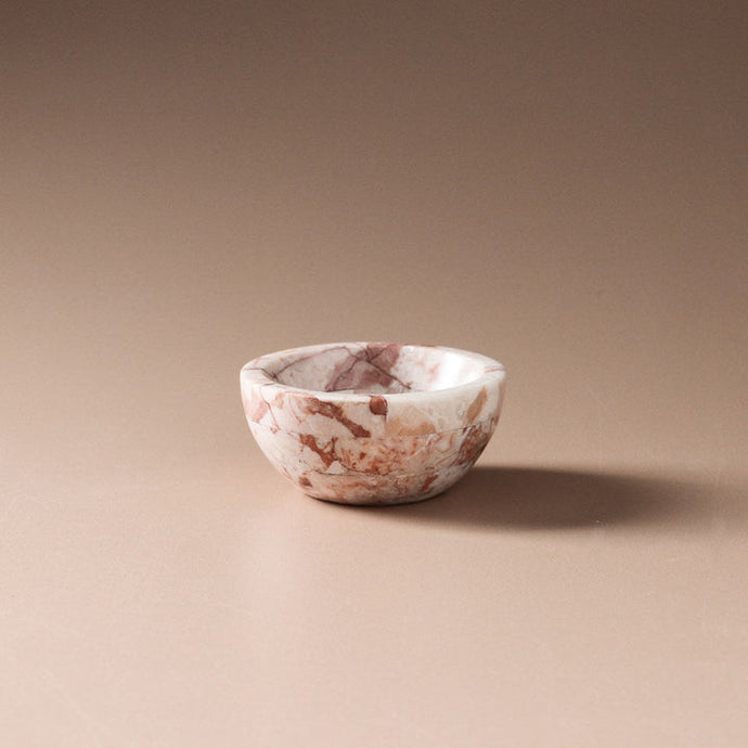 Naya Bowl Pink Lagoon by Indigo Love Collectors - A small marble bowl with pink and red veining.