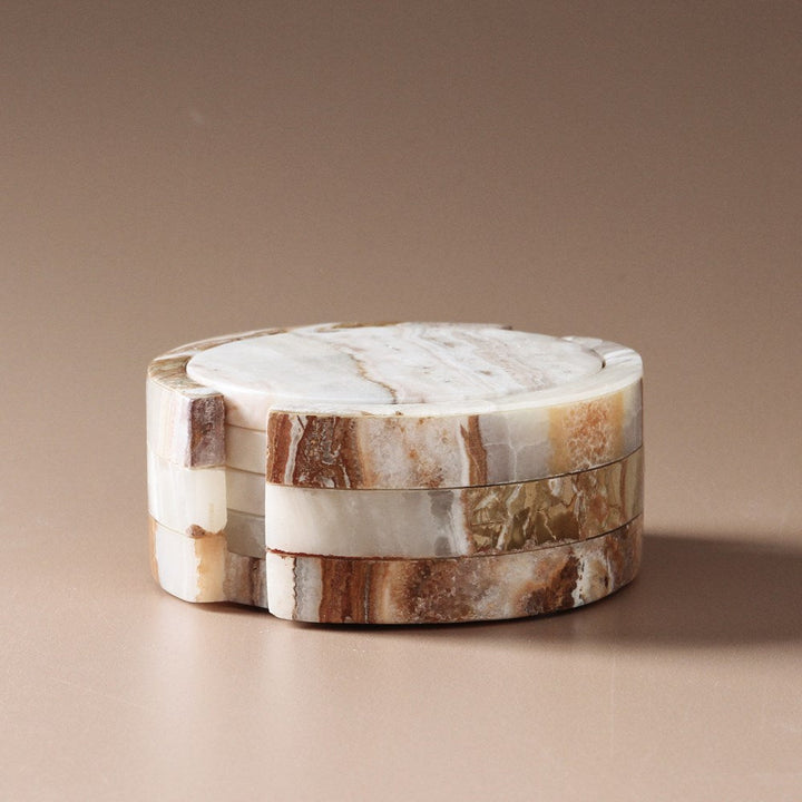 Odite Coasters Set of 4 Onyx Travertine by Indigo Love Collectors - A set of 4 marble coasters with amber veining.