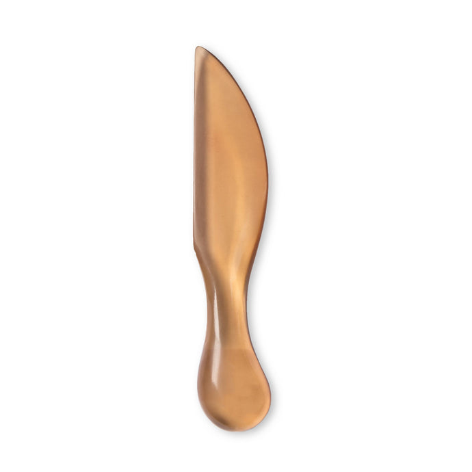Pate Knife Peach Tint by Keep Store - An image of a resin pate knife in peach tint.