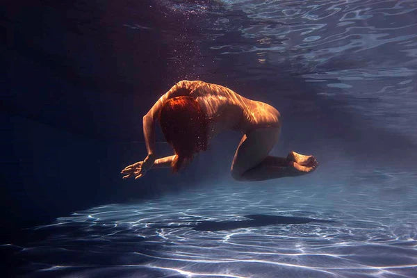 Signature Series - Glisten 01 by Francesca Owen - A photographic art print of a woman posing underwater.