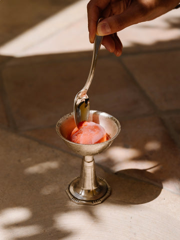 Strawberry Gelato by Via Tolila - A photography print of an elegant gelato scoop served in dessert silverware.