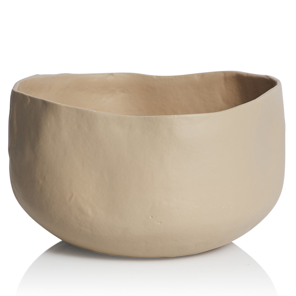 Taverna Panella Bowl Large by Canvas + Sasson - An image of an organically shaped bowl in a matte sand tone.