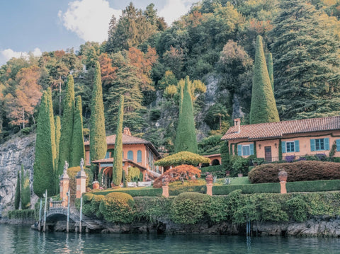 Villa La Cassinella by Stuart Cantor - A photographic print of a Spanish garden and architectural scene in red and green pastel colours set in The Marbella Club, Spain.