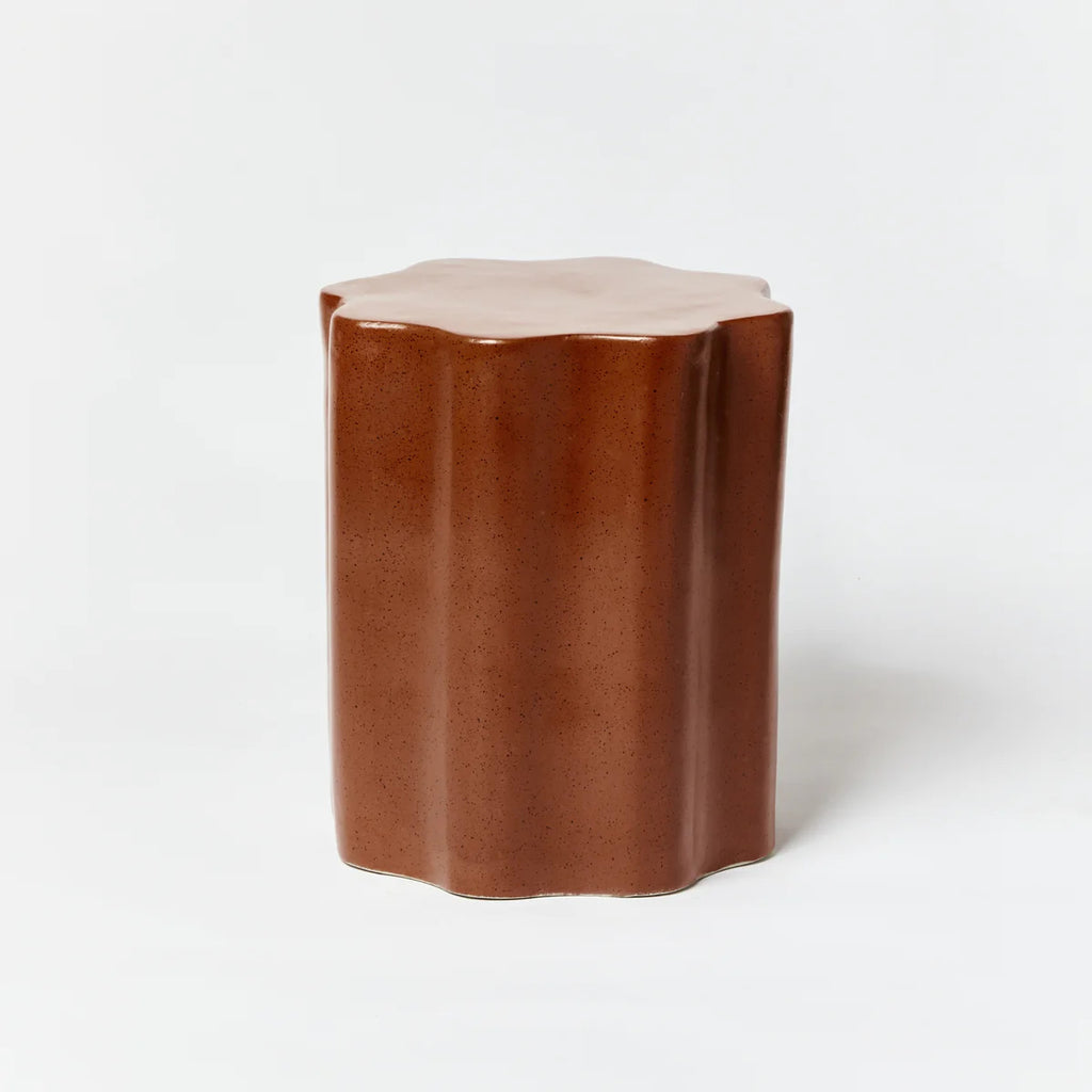 Wave Side Table Speckle Chocolate by Bonnie and Neil - An image of a curved, solid side table in chocolate speckle.