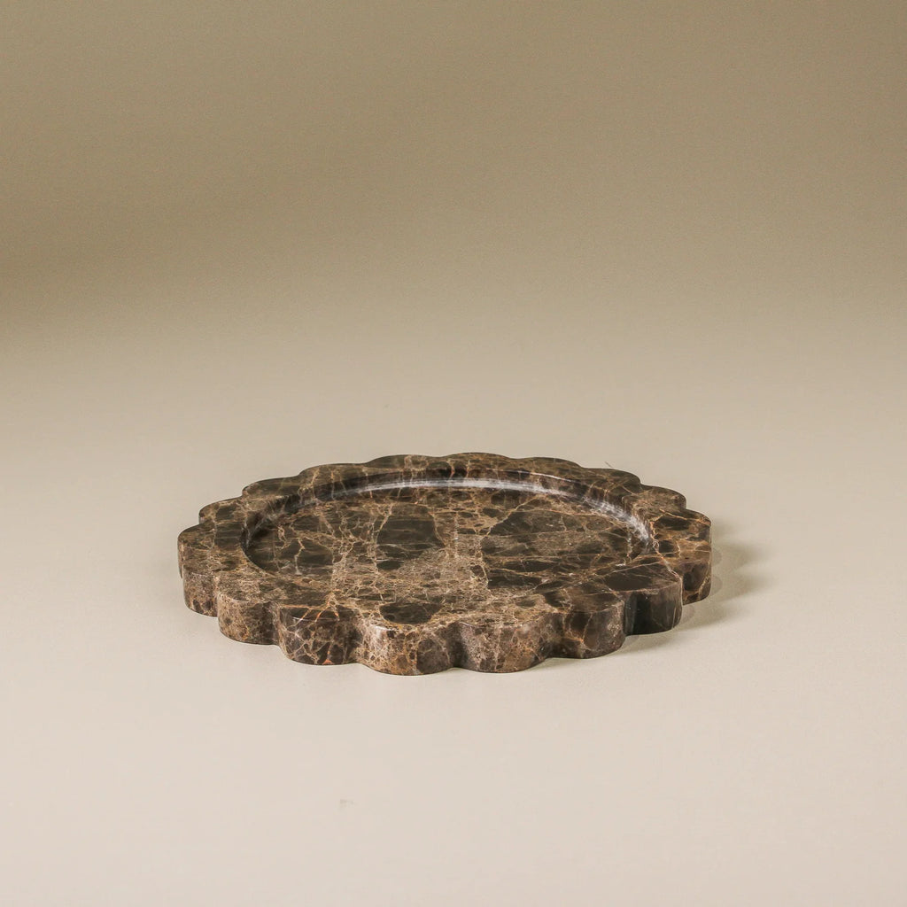 Calile Tray Brown Emperador Marble by Indigo Love - Scalloped edge round brown marble tray on beige background.