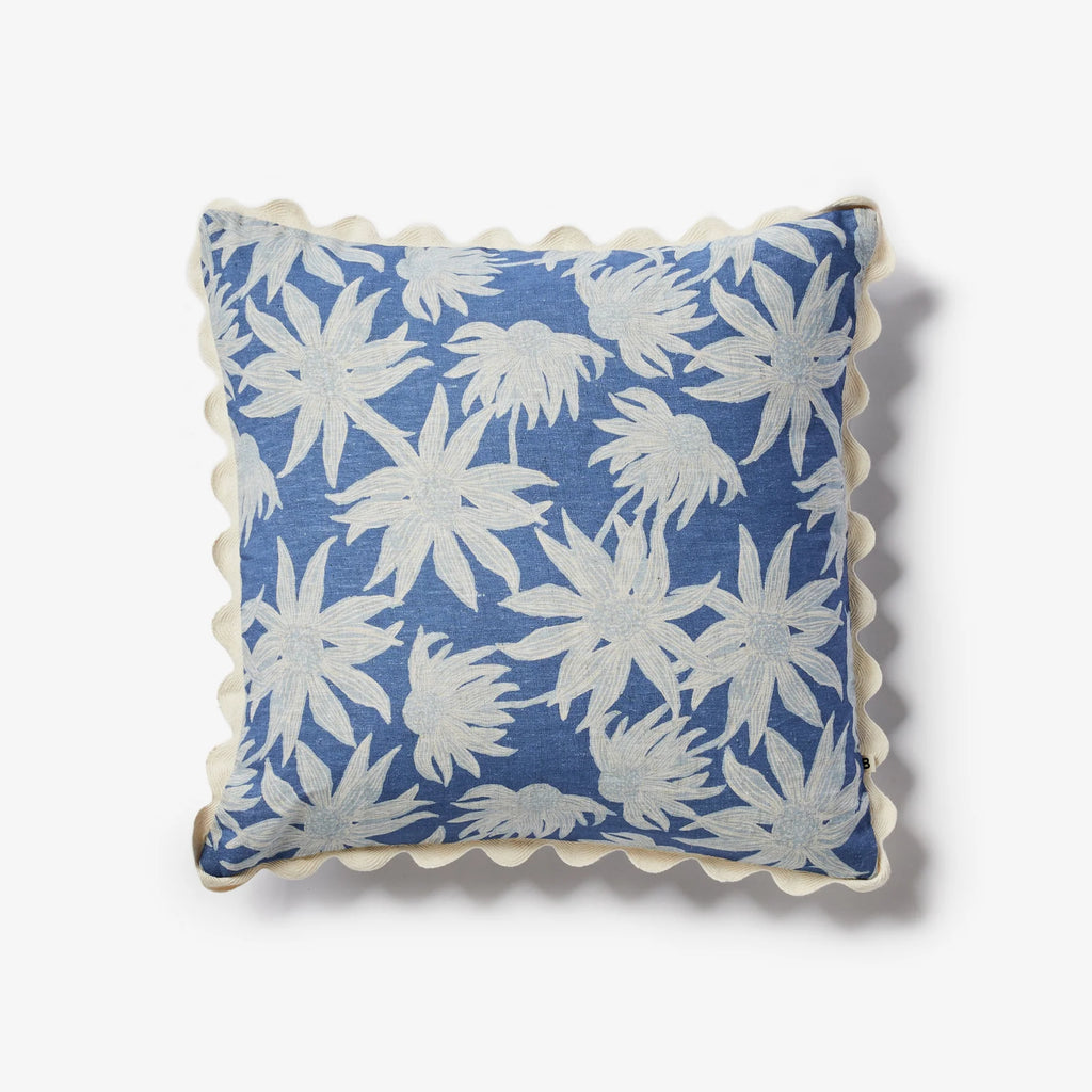 Floral blue and cream linen cushion with scalloped trim