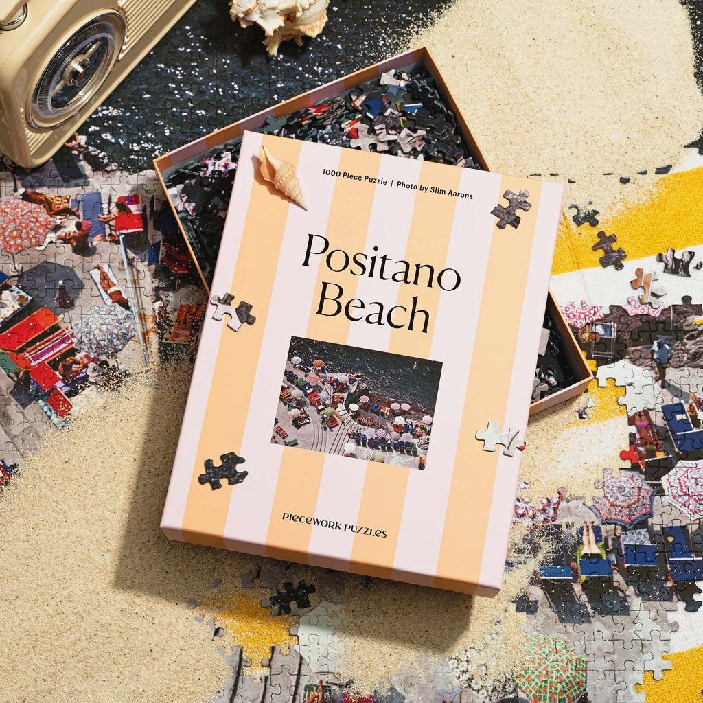 Positano Beach Puzzle - image of puzzle open on sand