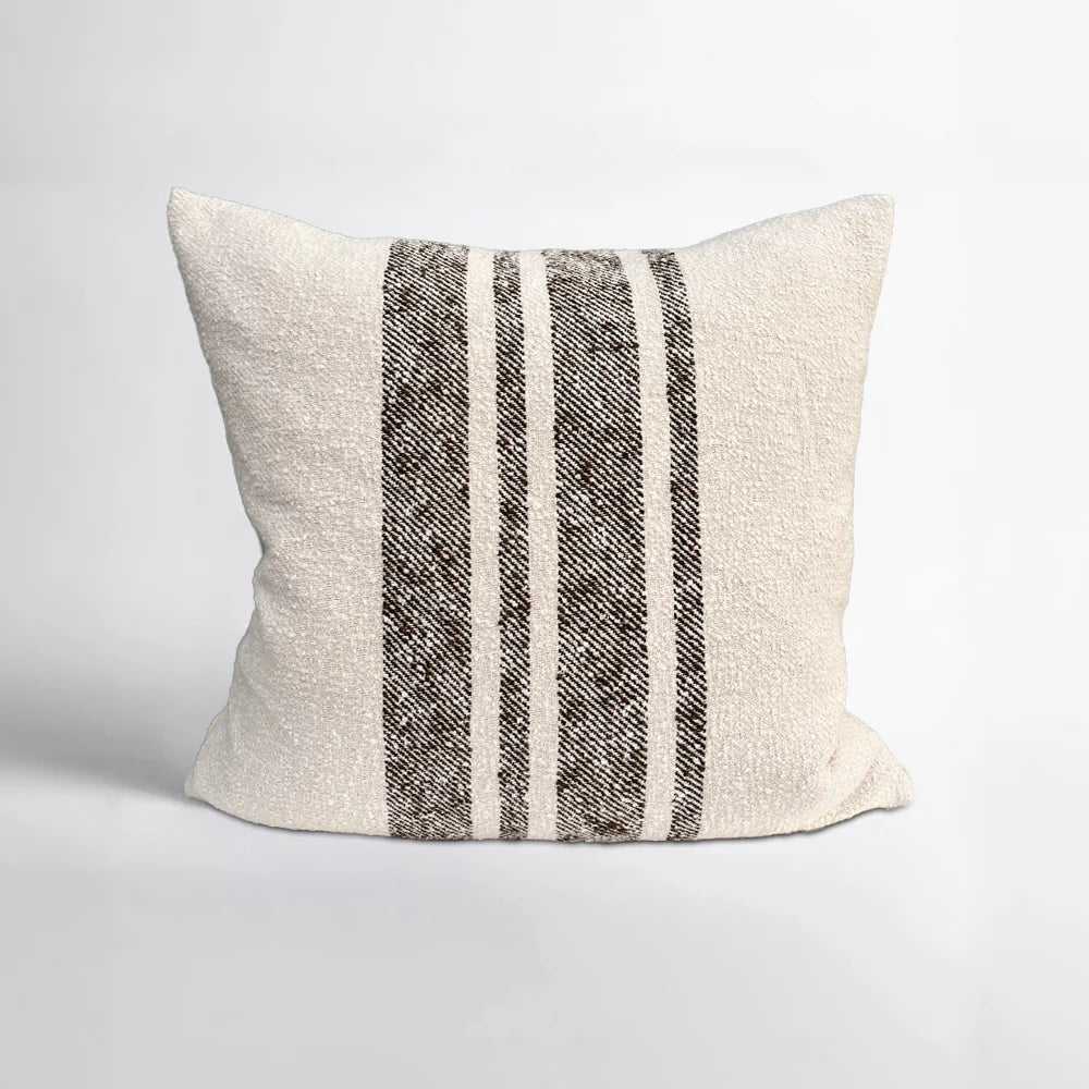 Sabla Cushion by Eadie Lifestyle - Decorative pillow with brown stripes on a light grey background.