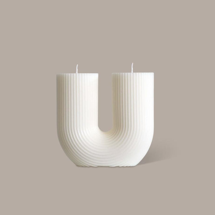 Curl Curl Candle - White by Black Blaze - An arched candle with two wicks with a modern, ribbed wax texture.