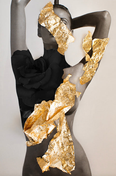 Golden Girl (with Black Rose) by Dina Broadhurst - A black and white nude figure, a black rose and textured gold leaf cover her body in a collage-style medium