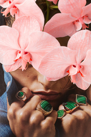 Play On My Mind (Pink Orchids) by Dina Broadhurst - A photograph of a face, covered by bright pink orchids.