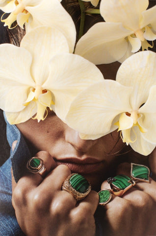 Play On My Mind by Dina Broadhurst - A collage artwork of a hidden woman's face with creamy yellow orchids on her head