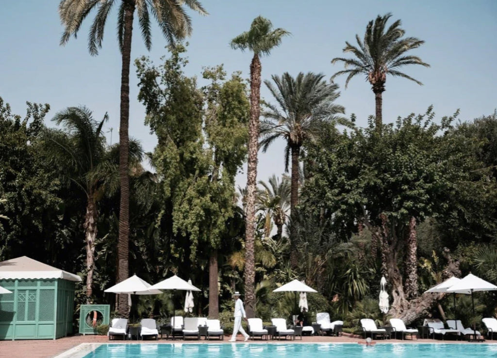 Pool & Palms by Stuart Cantor - A photographic print of a resort pool in Morocco with palm trees.