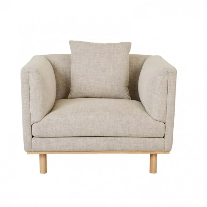 Sidney Fold Sofa Chair by GlobeWest - A light beige coloured arm chair with an exposed wooden base and legs.  