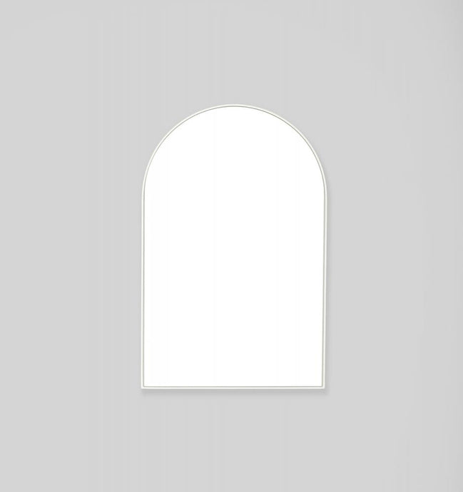 Bjorn Arch 55 x 85 Bright White Mirror by Middle of Nowhere. Streamline minimal design arch mirror with white frame to enhance any space.