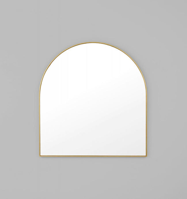 Bjorn Arch Brass Mirror by Middle of Nowhere. Streamline minimal design arch mirror with brass gold leafed engineered wood frame to enhance any space.