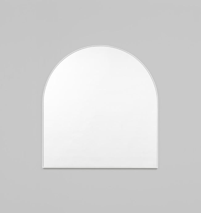 Bjorn Arch Bright White Mirror by Middle of Nowhere. Streamline minimal design arch mirror with bright white engineered wood frame to enhance any space.